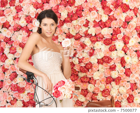 woman with bicycle and background full of roses woman with bicycle and background full of roses 7500077