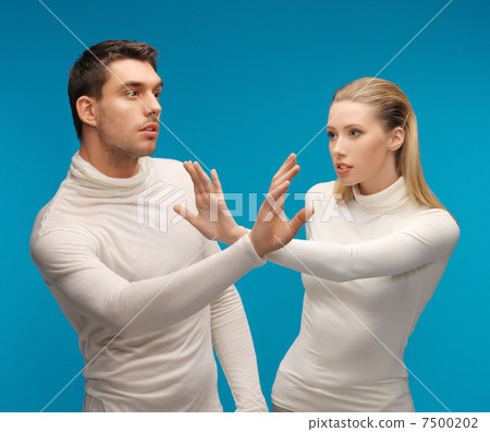 man and woman working with something imaginary man and woman working with something imaginary 7500202