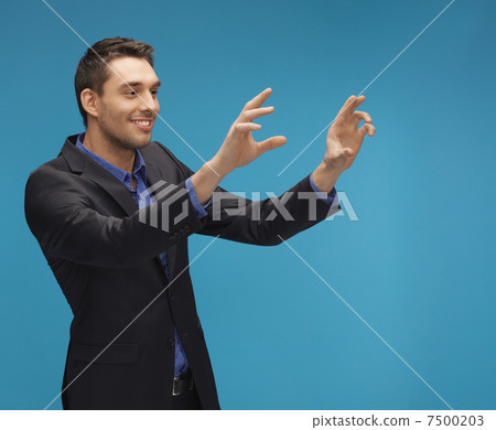 man in suit working with something imaginary man in suit working with something imaginary 7500203
