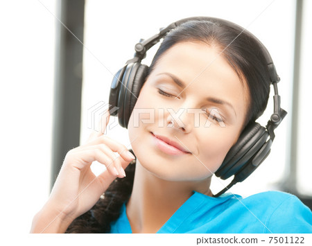 woman with headphones woman with headphones 7501122