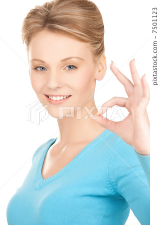 young woman showing ok sign young woman showing ok sign 7501123