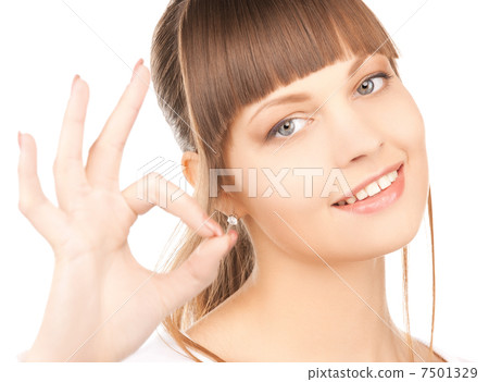 young woman showing ok sign young woman showing ok sign 7501329
