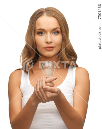 woman with energy saving bulb woman with energy saving bulb 7501488