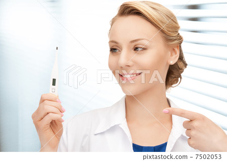 attractive female doctor with thermometer 7502053
