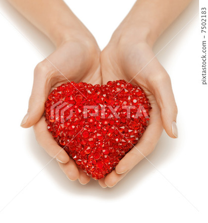 woman hands holding heart 7502183