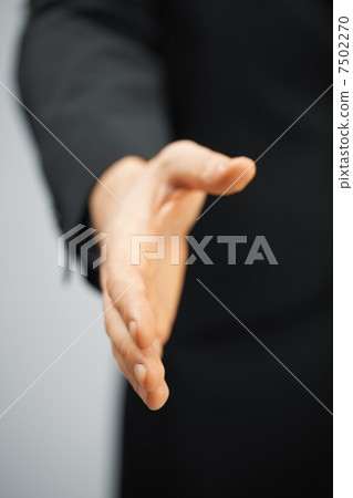man in suit with an open hand 7502270