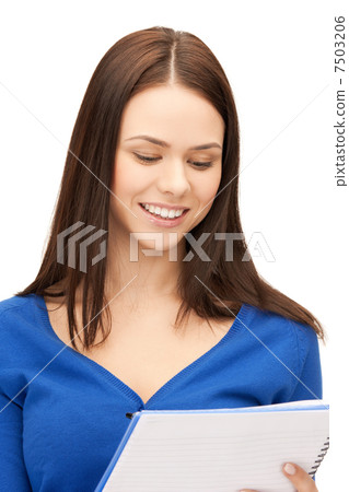 smiling young businesswoman with notebook smiling young businesswoman with notebook 7503206