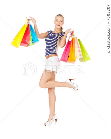 woman with shopping bags 7503207