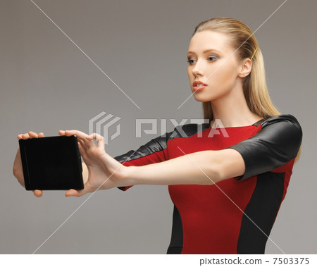 futuristic woman with tablet pc 7503375