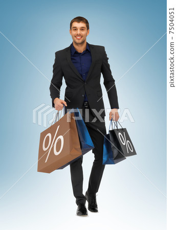 man with shopping bags 7504051