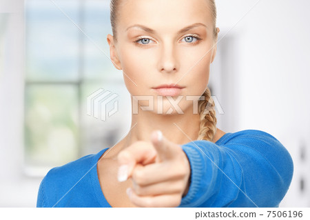 businesswoman pointing her finger 7506196