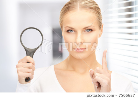 woman with magnifying glass woman with magnifying glass 7506687