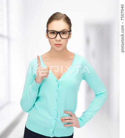 girl showing warning gesture girl showing warning gesture 7507040