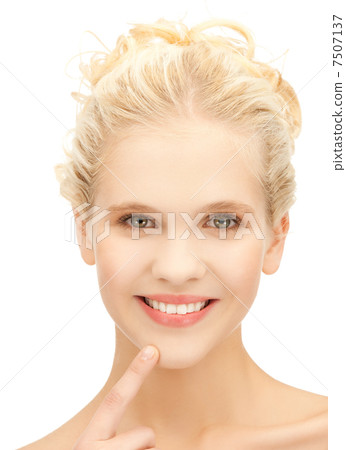woman showing her teeth woman showing her teeth 7507137