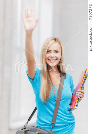 student with folders 7507278