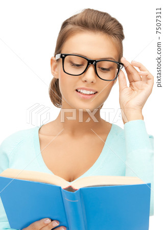 woman in glasses reading book 7507311