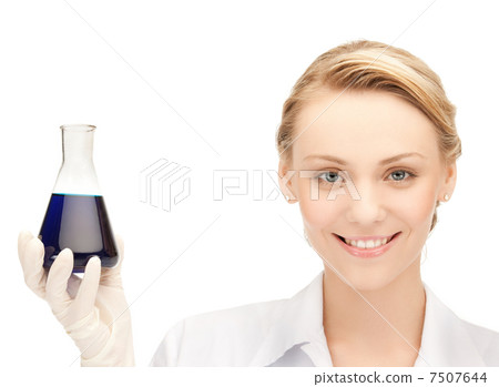 female chemist holding bulb with chemicals female chemist holding bulb with chemicals 7507644