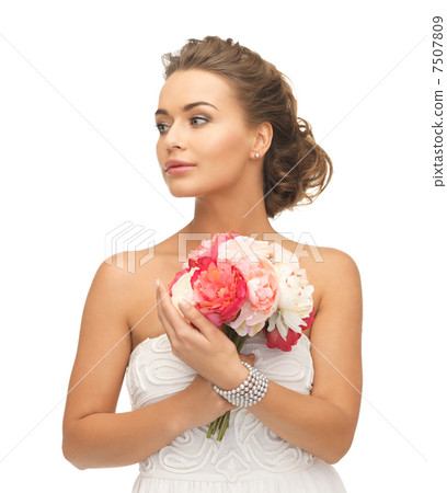 woman with bouquet of flowers woman with bouquet of flowers 7507809