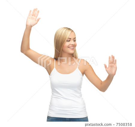 woman in white t-shirt pressing imaginary button 7508358