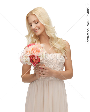 woman with bouquet of flowers woman with bouquet of flowers 7508530