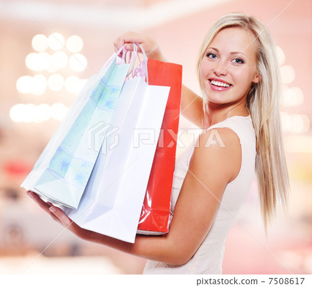 woman with shopping bags at shop woman with shopping bags at shop 7508617