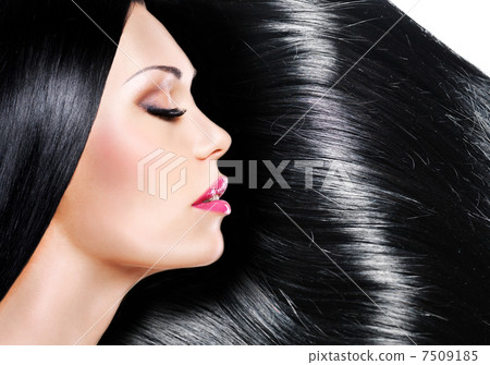 Beautiful woman with long black hair 7509185