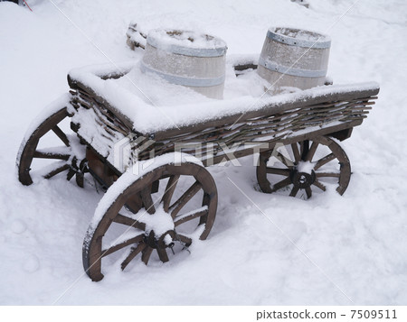 dray horse with barrels in the snow 7509511