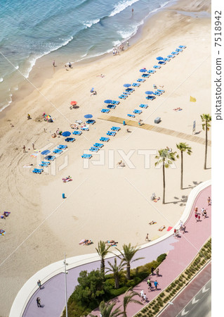 Sandy beach and bars at Benidorm 7518942