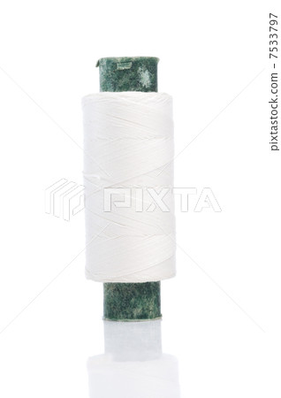 White spool (thread) isolated on white background. White spool (thread) isolated on white background. 7533797
