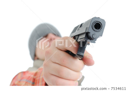 Young man is aiming with gun Young man is aiming with gun 7534611