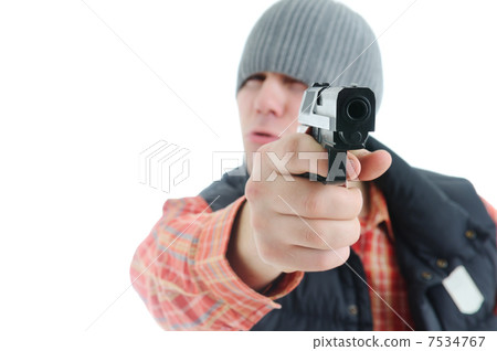 Young man is aiming with gun 7534767