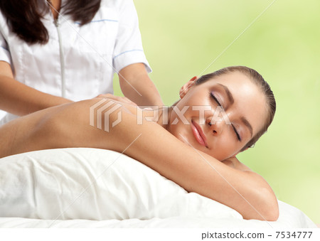 Beautiful woman at massage procedure 7534777