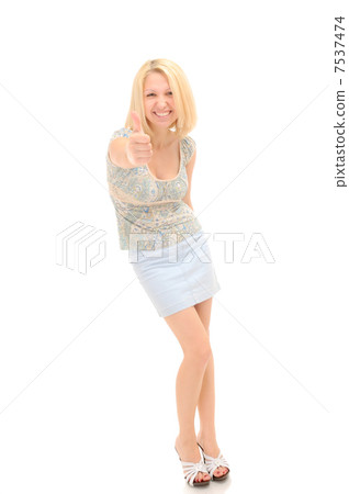 Attractive blonde with thumbs up Attractive blonde with thumbs up 7537474