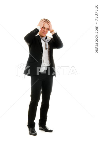 Young stressed businessman. Young stressed businessman. 7537510