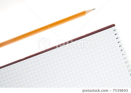 pencil and notebook over white 7539693