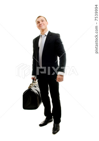 Handsome man with travelling bag Handsome man with travelling bag 7539994