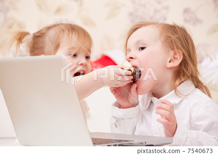 Children with laptop indoors. Children with laptop indoors. 7540673