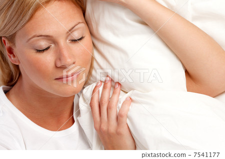 Young woman in bed. Young woman in bed. 7541177