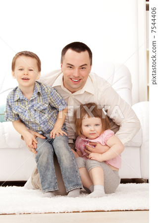 Portrait of a happy young guy with kids Portrait of a happy young guy with kids 7544406