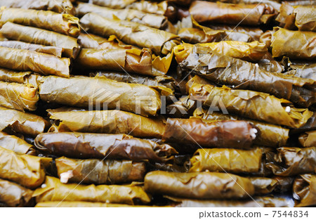 Homemade food in pot prepared for cooking, vegetable filled with a meat, grape leaves 7544834