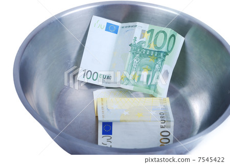 Money in dish prepared for cooking Money in dish prepared for cooking 7545422
