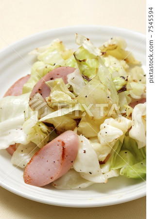 Fried sausage and sautéed cabbage 7545594