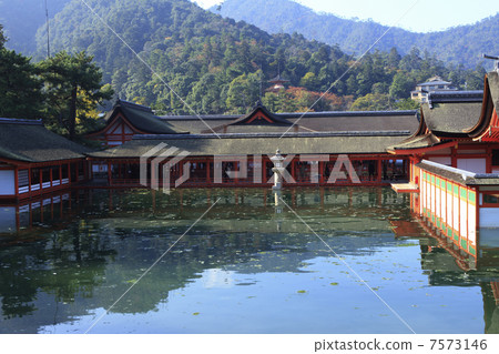 Itsukushima shrine reflected on the sea surface Itsukushima shrine reflected on the sea surface 7573146