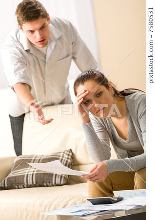 Worried arguing couple has financial crisis Worried arguing couple has financial crisis 7580531