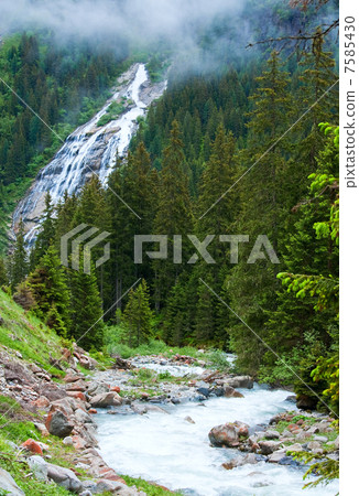Alps waterfall summer view Alps waterfall summer view 7585430