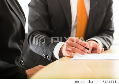 businesspersons in business office 7585551