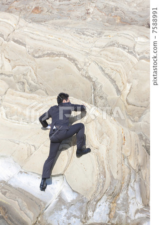 攀登岩石的商人 7588991