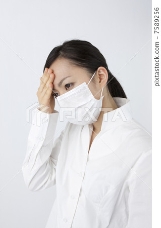 A woman holding a head A woman holding a head 7589256