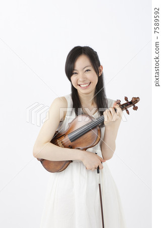 A woman with a violin A woman with a violin 7589592