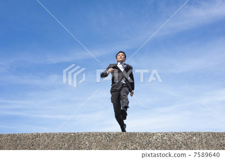 Running businessman 7589640